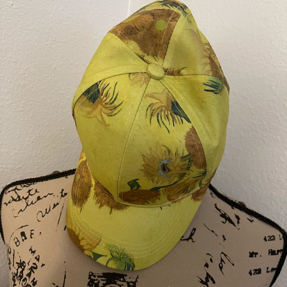 Yellow daisy baseball cap used. Purchased at the Van Gogh exhibition.